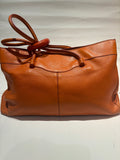 Tod’s orange leather pebble tote bag